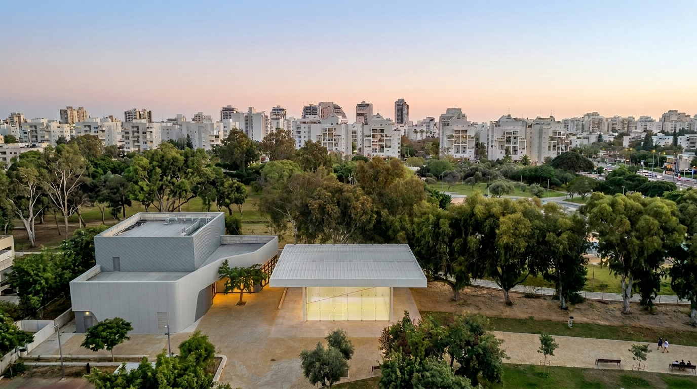 Aerial view of the Tpoint pavilion with park and skyline at dusk